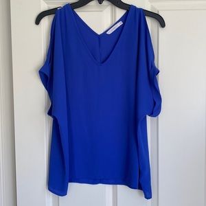 Blue blouse with cutout shoulders